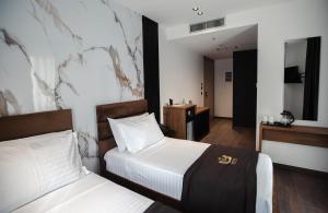 Postel nebo postele na pokoji v ubytování Destiny Hotel & SPA