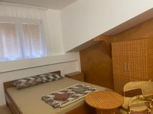 Postelja oz. postelje v sobi nastanitve Hostel Izvor