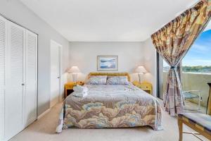 Postel nebo postele na pokoji v ubytování Arcadian One 04a