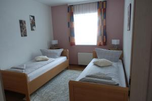 Posteľ alebo postele v izbe v ubytovaní Apartmenthaus Kestel