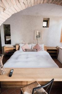 Postel nebo postele na pokoji v ubytování Agriturismo Le Valli