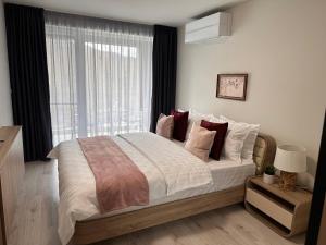 Tempat tidur dalam kamar di ATEA Apartments