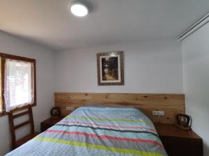 Postel nebo postele na pokoji v ubytování apartamento dúplex en la Molina