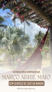 a poster of a hammock in front of palm trees at Tiki Pool's Bungalows in Fortim