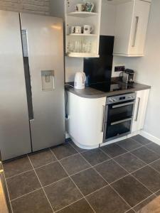 Köök või kööginurk majutusasutuses House & hot tub in Torbay Devon Torquay