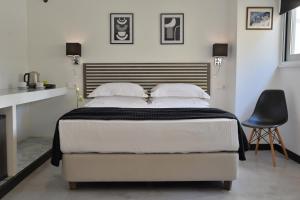 Кровать или кровати в номере Alter Athens