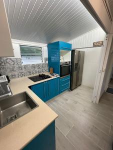 Kuchyň nebo kuchyňský kout v ubytování La Casita Ilohë