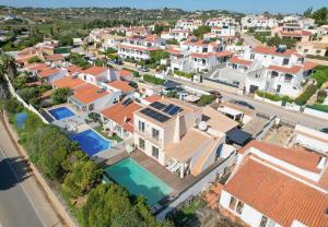 an aerial view of a residential neighborhood with houses at Villa Primavera in Lagos