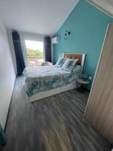Postel nebo postele na pokoji v ubytování La Casita Ilohë