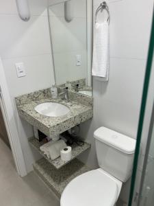 Koupelna v ubytování Condomínio Kaimã + 12 fotografií