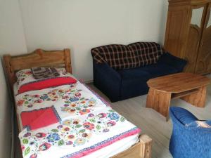 Postel nebo postele na pokoji v ubytování Oddychový pobyt na rodinnej farme