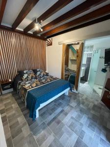 Postel nebo postele na pokoji v ubytování La Casita Ilohë