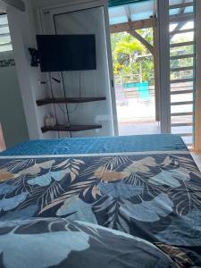Postel nebo postele na pokoji v ubytování La Casita Ilohë