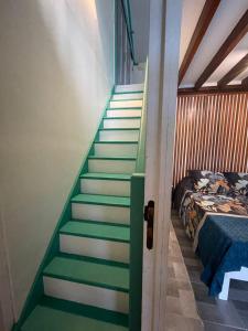 Postel nebo postele na pokoji v ubytování La Casita Ilohë