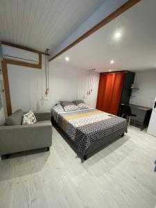 Postel nebo postele na pokoji v ubytování La Casita Ilohë