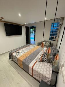 Postel nebo postele na pokoji v ubytování La Casita Ilohë