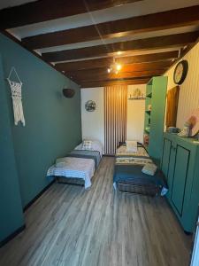 Postel nebo postele na pokoji v ubytování La Casita Ilohë