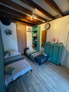 Postel nebo postele na pokoji v ubytování La Casita Ilohë