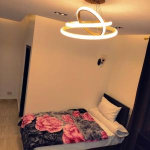 Ένα ή περισσότερα κρεβάτια σε δωμάτιο στο Summer Land Hotel