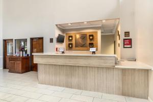 a lobby of a hospital with a reception counter at Comfort Suites Bush Intercontinental Airport in Houston