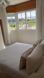 Postel nebo postele na pokoji v ubytování Piso Areal con vistas al mar