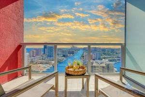 a balcony with a view of a river at Amenities BALCONY w Stunning Views-Beachfront in Hallandale Beach