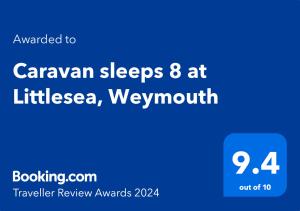 una señal azul con las palabras "caravanas" en littelsea en Caravan sleeps 8 at Littlesea, Weymouth, en Wyke Regis