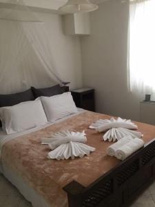 Ένα ή περισσότερα κρεβάτια σε δωμάτιο στο Hide Away Home in Nafplio Discounts