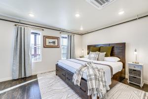 a bedroom with a large bed and a window at Historic Hollister Home Shop, Dine and Drink Nearby in Hollister