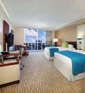 Tempat tidur dalam kamar di Trump International Beach Resort - Sunny Isles Beach