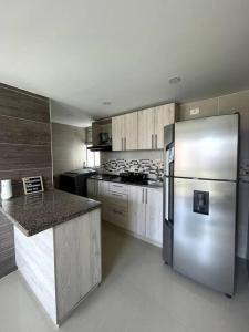 ครัวหรือมุมครัวของ Apartamento en cuarto piso en Turquesa.