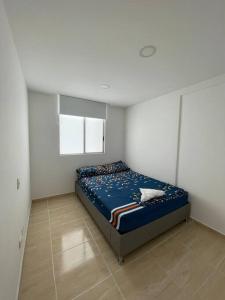 Posteľ alebo postele v izbe v ubytovaní Apartamento en quinto piso Valle del Lili, Zafiro C
