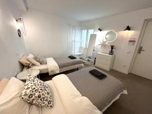 Postel nebo postele na pokoji v ubytování Hola Hostel Alicante