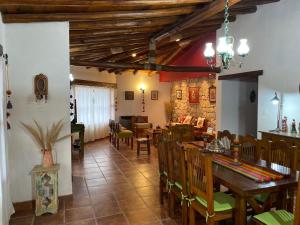 a dining room with a table and chairs at CASA SAMAÑA in Tilcara