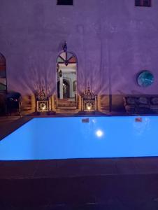 Bazén v ubytování Hotel Riad Sahara Activity nebo v jeho okolí