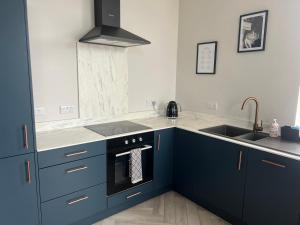 Køkken eller tekøkken på North Coast Boutique Apartment