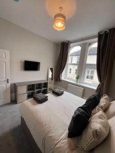 Et tv og/eller underholdning på North Coast Boutique Apartment