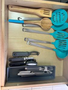 a drawer filled with lots of utensils at Apartment in Hollywood close to shops and beach in Hollywood