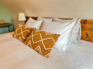 Postel nebo postele na pokoji v ubytování Mes Caprices B&B Villa Mosan Bord de Meuse