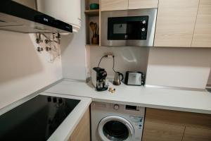 Kuchyň nebo kuchyňský kout v ubytování Jardín de Mariote Apartment