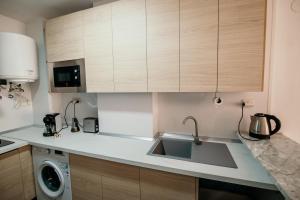 Kuchyň nebo kuchyňský kout v ubytování Jardín de Mariote Apartment