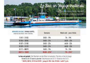 a boat that is sitting in the water at L'échappée Belle "15 min Europa Park" in Rhinau