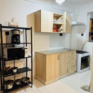 A kitchen or kitchenette at Step out Gem