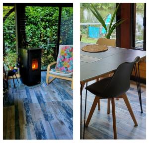 een tafel, een stoel en een houtkachel bij Maison de vacances: chez Nirina in Mortagne-sur-Sèvre