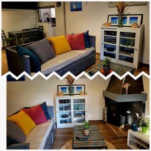 un salon avec un canapé et une cheminée dans l'établissement Chez Nirina proche Puys DuFou, à Mortagne-sur-Sèvre