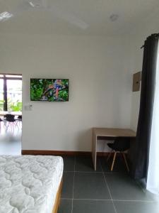Postel nebo postele na pokoji v ubytování Toucan home