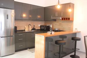 Kuchyň nebo kuchyňský kout v ubytování KANDAKE APARTMENT Sal Rei Wi-Fi + 26 fotografií