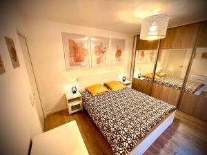 Katil atau katil-katil dalam bilik di Cosy & Countryside at 25km from Paris