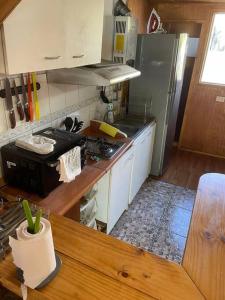 Dapur atau dapur kecil di Hermosa Cabaña Duplex en Villa Alto de Puerto Varas