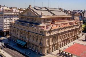 a large building in the middle of a city at Teatros Buenos Aires - Amplio y Cómodo en Gran ubicación 5 personas Cuidamos tu estadía! in Buenos Aires